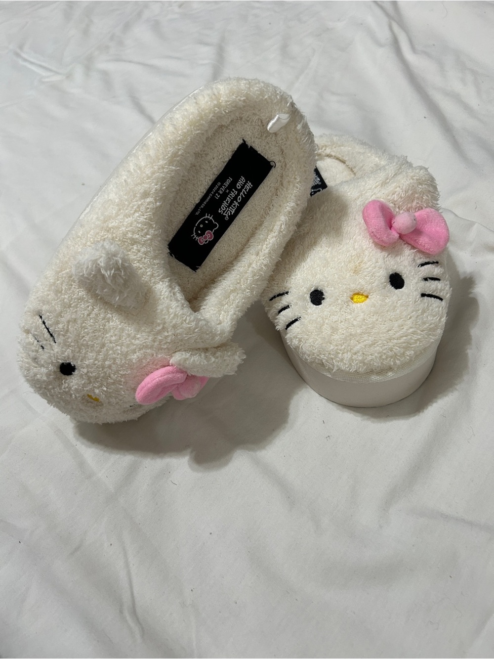 Forever 21 Kids Cream Fuzzy Hello Kitty Slip-On Boots - Picture 5 of 11